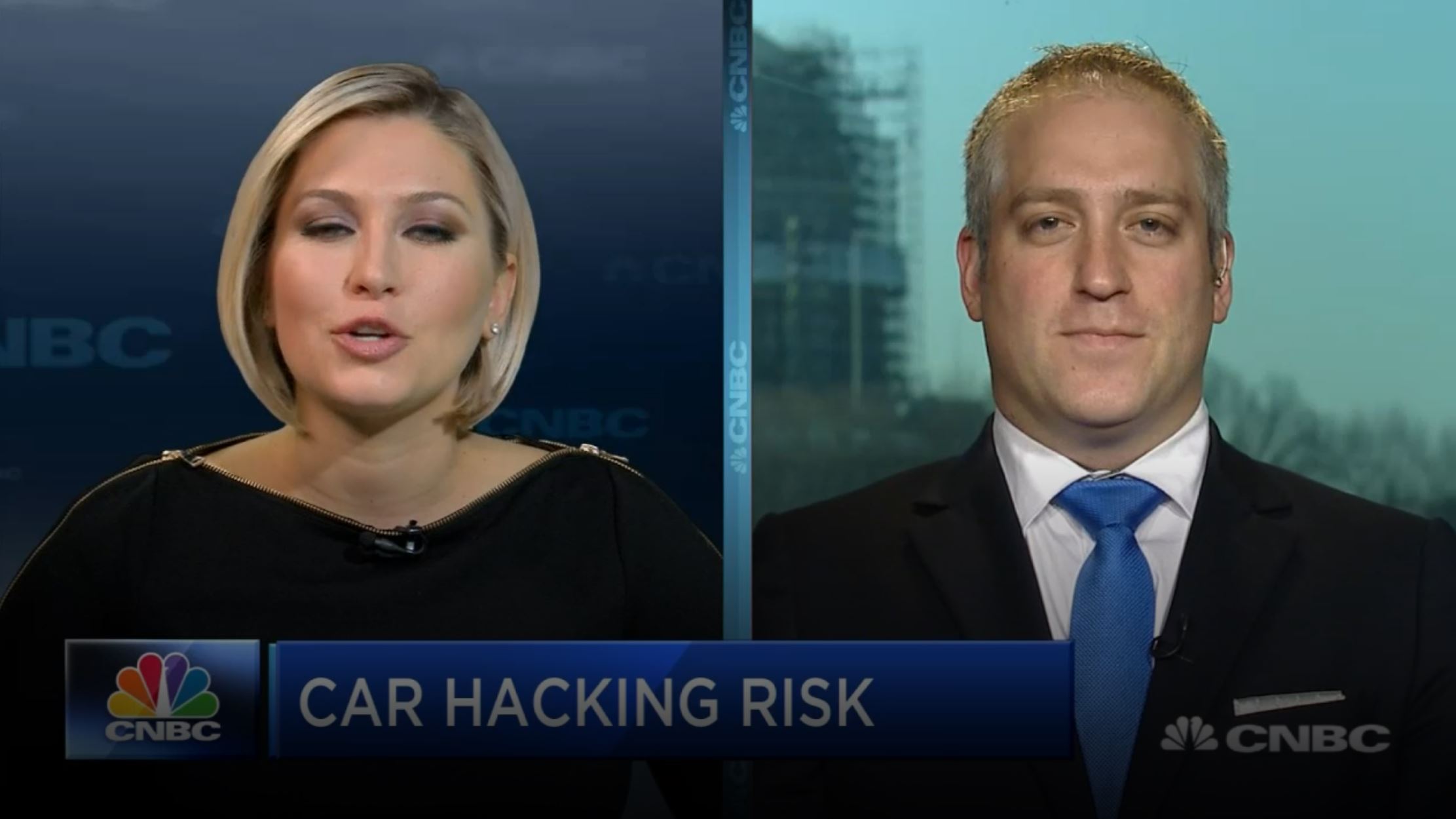 Adam Zuckerman on CNBC opposite anchor Morgan Brennan, in a split screen under a chyron reading Car hacking risk
